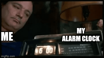 smashing alarm clock gif