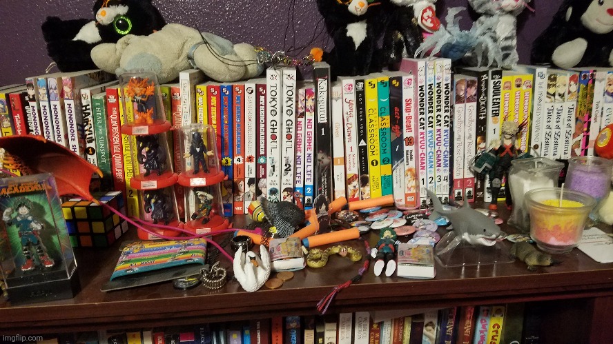 top of bookshelf 1, manga and collectibles and stuff | made w/ Imgflip meme maker