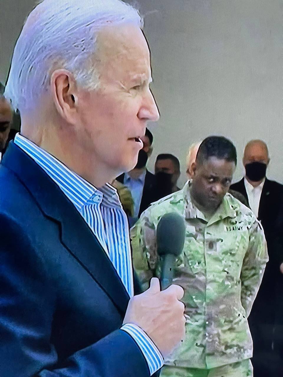 High Quality soldier gives biden a look of disgust Blank Meme Template