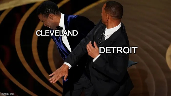 Detroit | CLEVELAND; DETROIT | image tagged in will smith punching chris rock | made w/ Imgflip meme maker