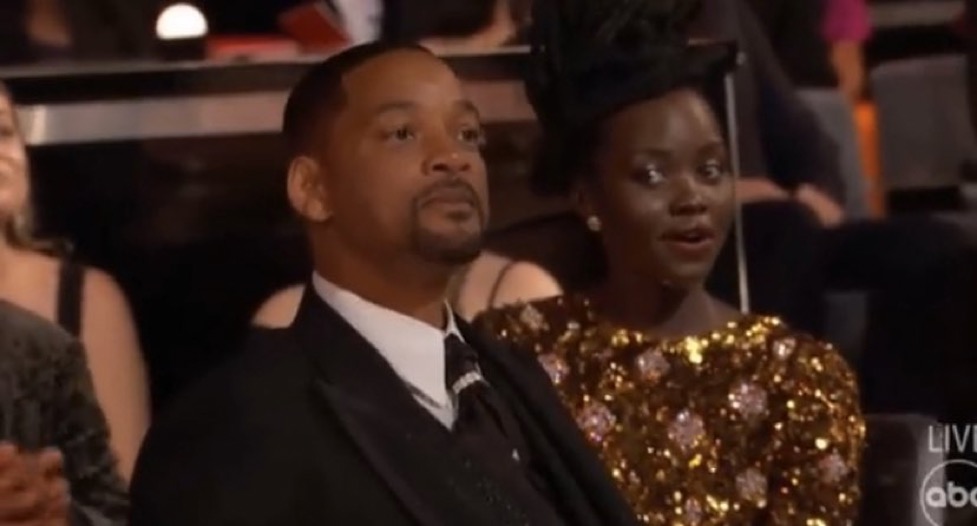 Lupita looking at Will Smith Blank Meme Template