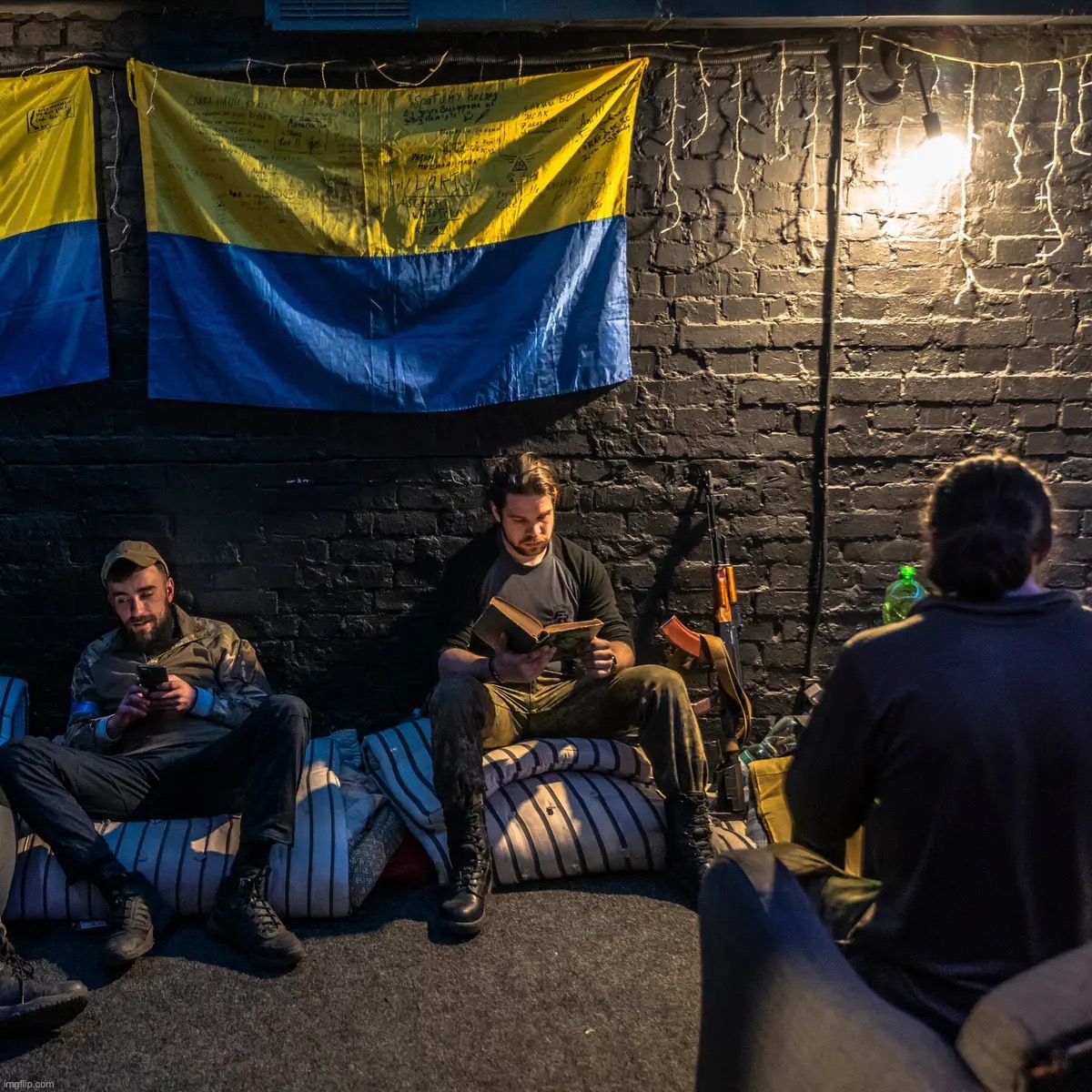 Ukrainian soldiers take a well-earned break. | image tagged in ukrainian soldiers take a break,ukrainian lives matter,ukraine,ukrainian,soldiers,soldier | made w/ Imgflip meme maker