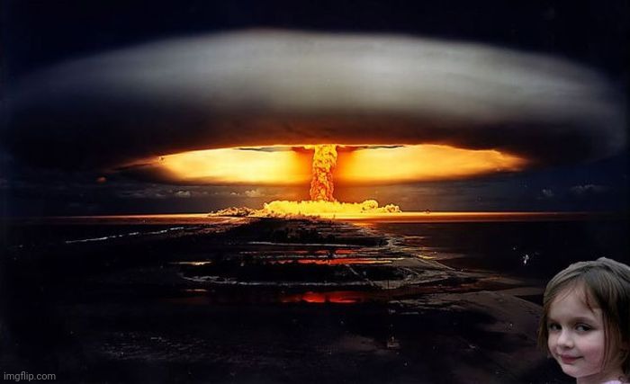 Disaster Girl Nukes 'Em | image tagged in disaster girl nukes 'em | made w/ Imgflip meme maker