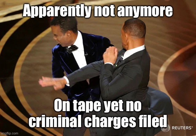 Will Smith punching Chris Rock | Apparently not anymore On tape yet no criminal charges filed | image tagged in will smith punching chris rock | made w/ Imgflip meme maker