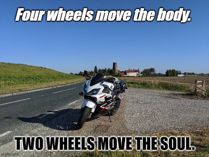 Freedom | Four wheels move the body. TWO WHEELS MOVE THE SOUL. | image tagged in motorbike | made w/ Imgflip meme maker