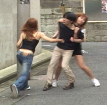 Two Asian girls beating up Asian guy Blank Meme Template