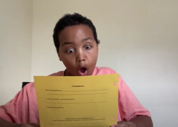 Suprised kid reading paper Blank Meme Template