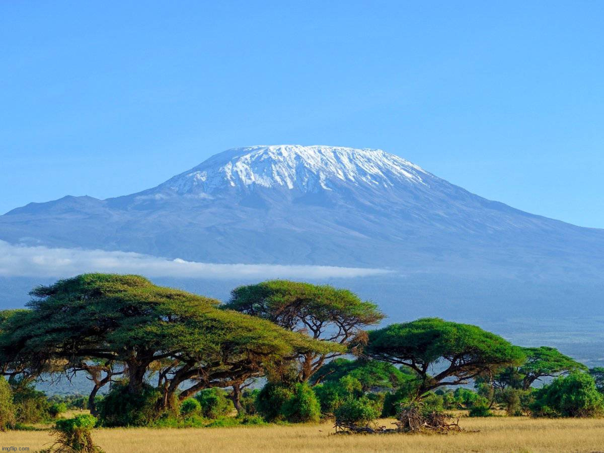 Mount Kilimanjaro in Tanzania | image tagged in awesome | made w/ Imgflip meme maker