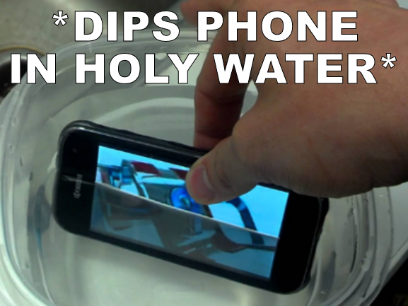 Dips phone in holy water Blank Meme Template