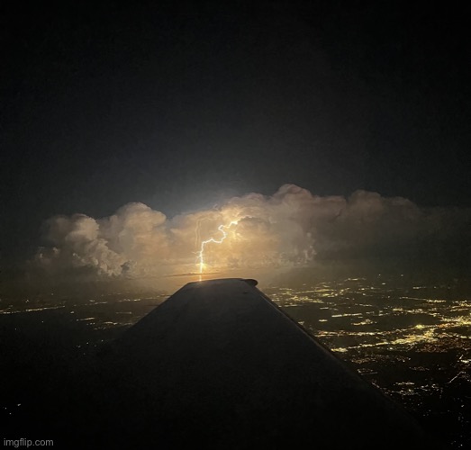 i took this pic, sent it to my frend. they posted it. and now im posting it bc I TOOK THE PICTURE | image tagged in lightning strikes plane | made w/ Imgflip meme maker