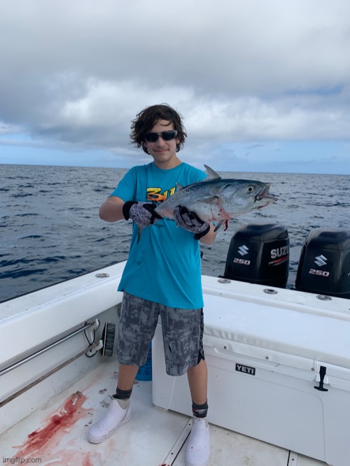 This fish is called a bonita. It fought hard and it was very fun | made w/ Imgflip meme maker
