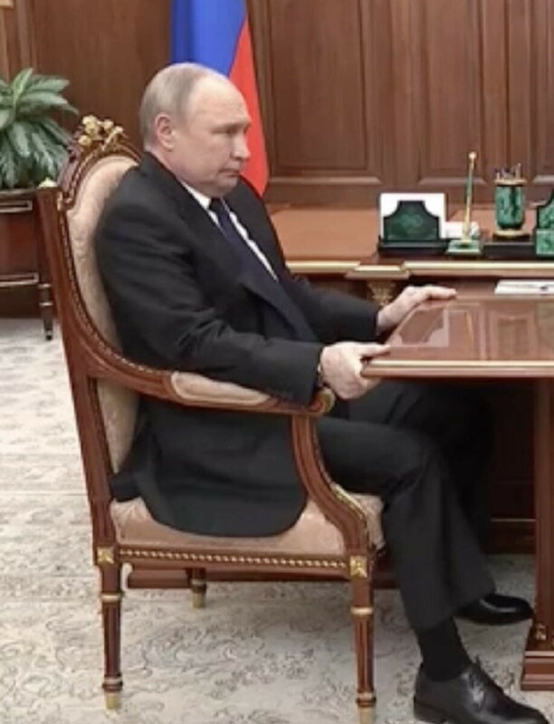 Putin clutching onto the table Blank Meme Template
