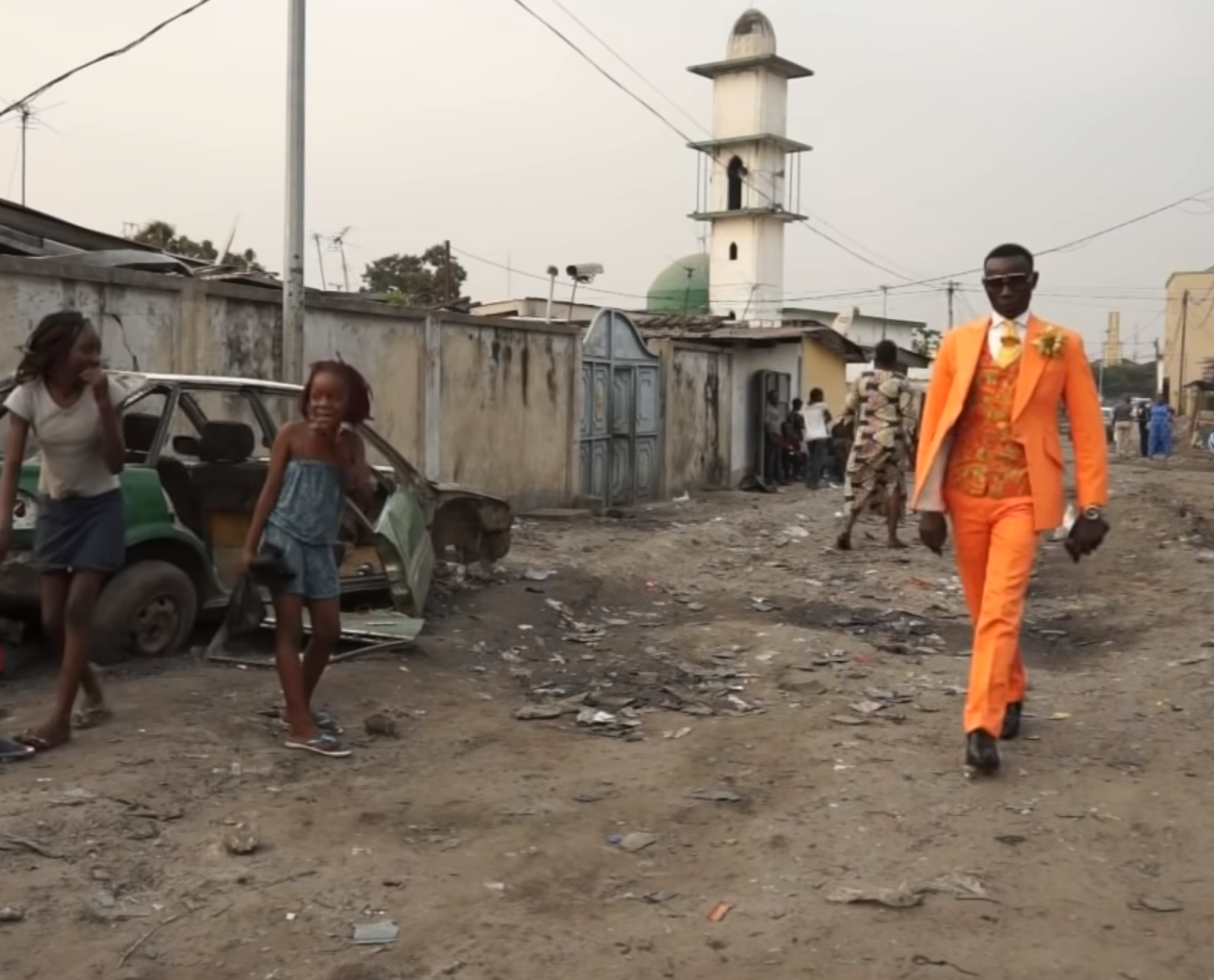 Cool guy walking down the slums Blank Meme Template