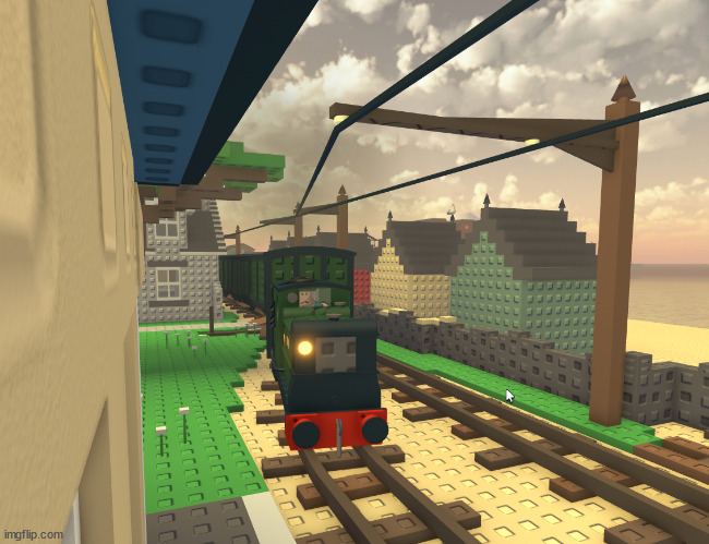 a tiny train in a big town. | made w/ Imgflip meme maker
