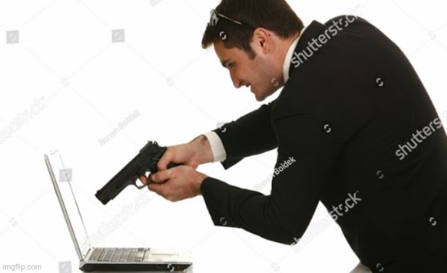 Man shooting computer | image tagged in man shooting computer | made w/ Imgflip meme maker