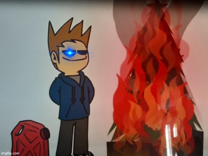 Tom burning a Christmas tree | image tagged in tom burning a christmas tree | made w/ Imgflip meme maker