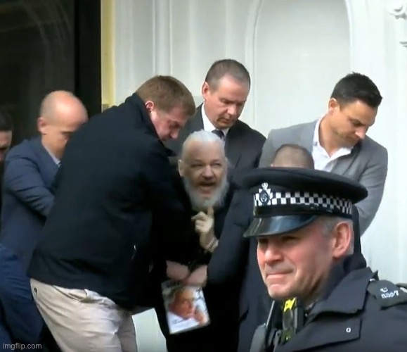 Awkward Assange | image tagged in awkward assange | made w/ Imgflip meme maker