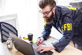 FBI agent on laptop computer Blank Meme Template