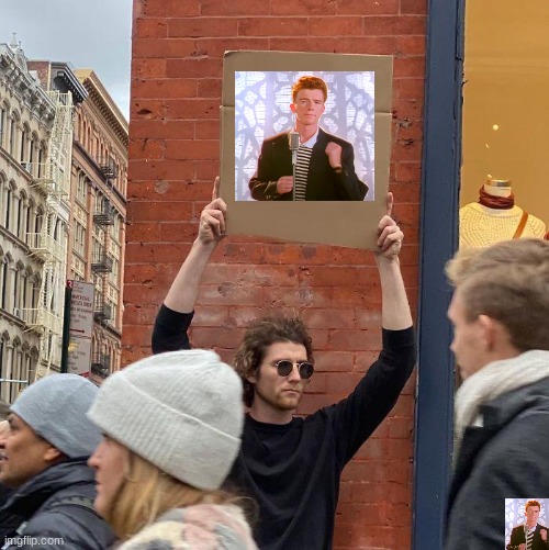 totally not a rick roll | image tagged in memes,guy holding cardboard sign,rick roll | made w/ Imgflip meme maker