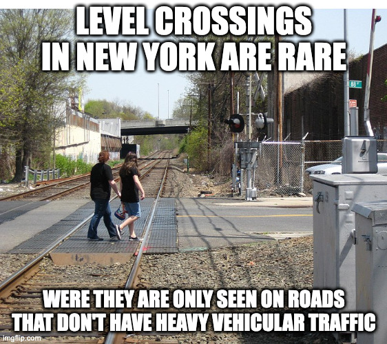 Woodhaven Blvd Level Crossing | LEVEL CROSSINGS IN NEW YORK ARE RARE; WERE THEY ARE ONLY SEEN ON ROADS THAT DON'T HAVE HEAVY VEHICULAR TRAFFIC | image tagged in trains,memes,nyc | made w/ Imgflip meme maker