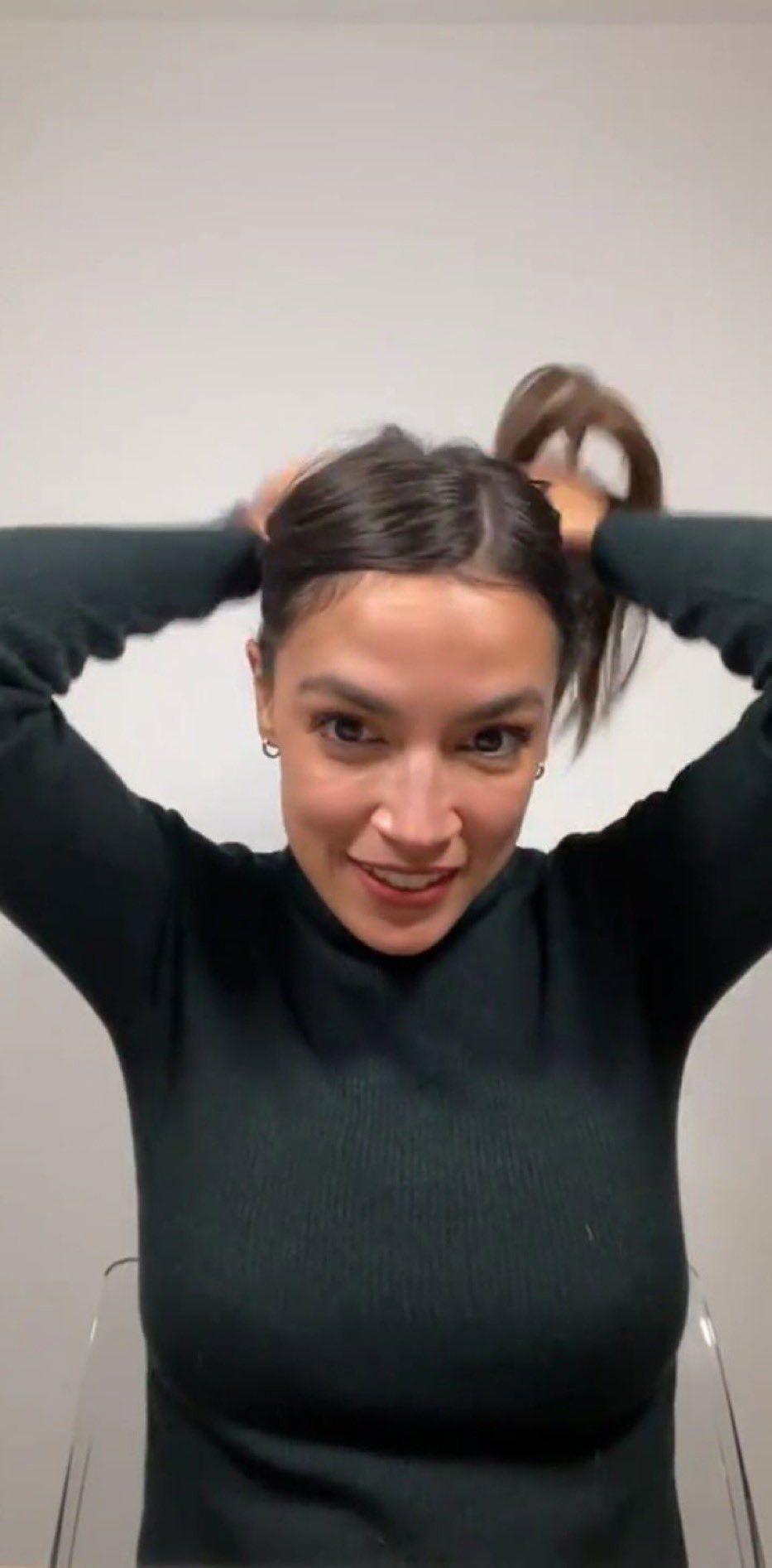 AOC Tying Her Hair Blank Meme Template