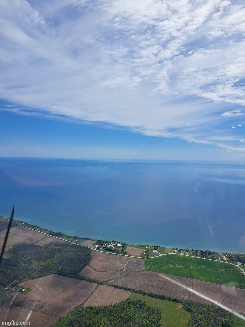 Beautiful day for flying on lake Michigan | image tagged in airplane,lake michigan | made w/ Imgflip meme maker