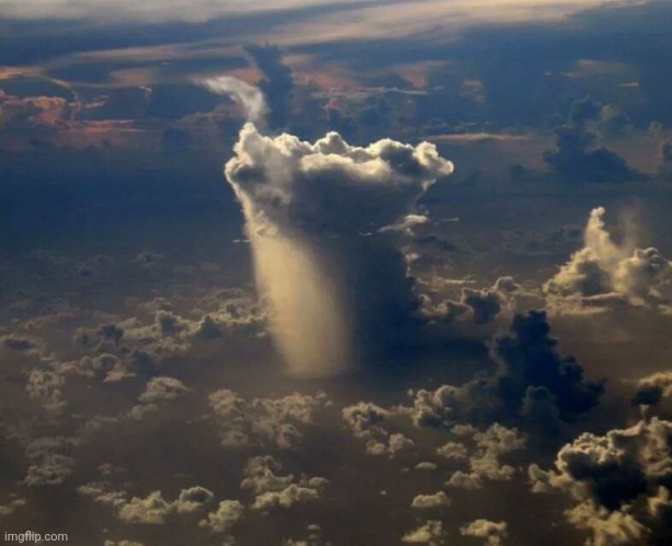 What Rain looks like from a Plane | image tagged in rain,thunderstorm,awesomeness,mother nature | made w/ Imgflip meme maker