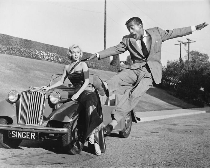 Marilyn Monroe And Sammy Davis Jr. On The 20th Century Fox Lot, 1953 | image tagged in awesome,pics,photography | made w/ Imgflip meme maker