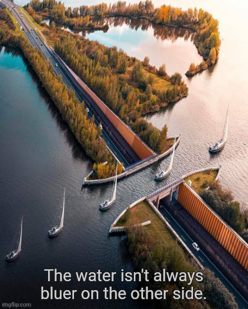 The Veluwemeer Water Bridge | The water isn't always bluer on the other side. | image tagged in bridge,lake,sailing | made w/ Imgflip meme maker