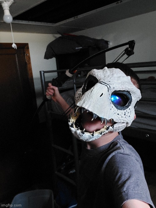 Update on the mask! (Ft. My bow 'n arrow) | image tagged in dino mask,bow | made w/ Imgflip meme maker