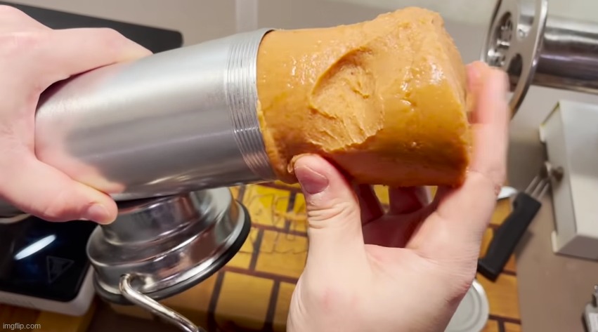 you guys are the first people on imgflip to see a man put a lump of refried beans in a sausage press | made w/ Imgflip meme maker