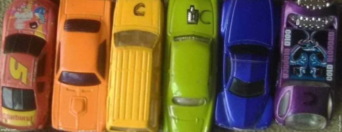 I got bored, so have a line of rainbow cars | image tagged in rainbow,cars,lgbtq,pride | made w/ Imgflip meme maker