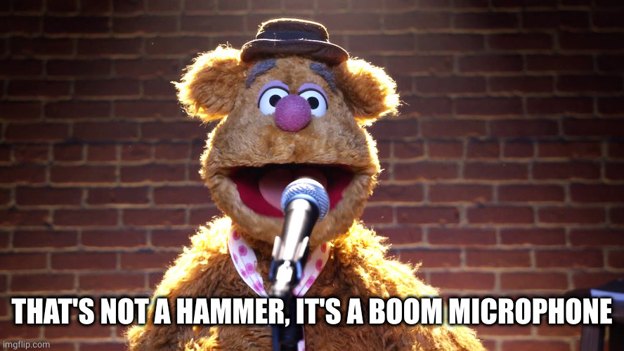 Fozzie Bear at Microphone | THAT'S NOT A HAMMER, IT'S A BOOM MICROPHONE | image tagged in fozzie bear at microphone | made w/ Imgflip meme maker