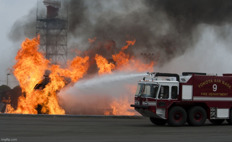 Fire truck putting out fire | image tagged in fire truck putting out fire | made w/ Imgflip meme maker