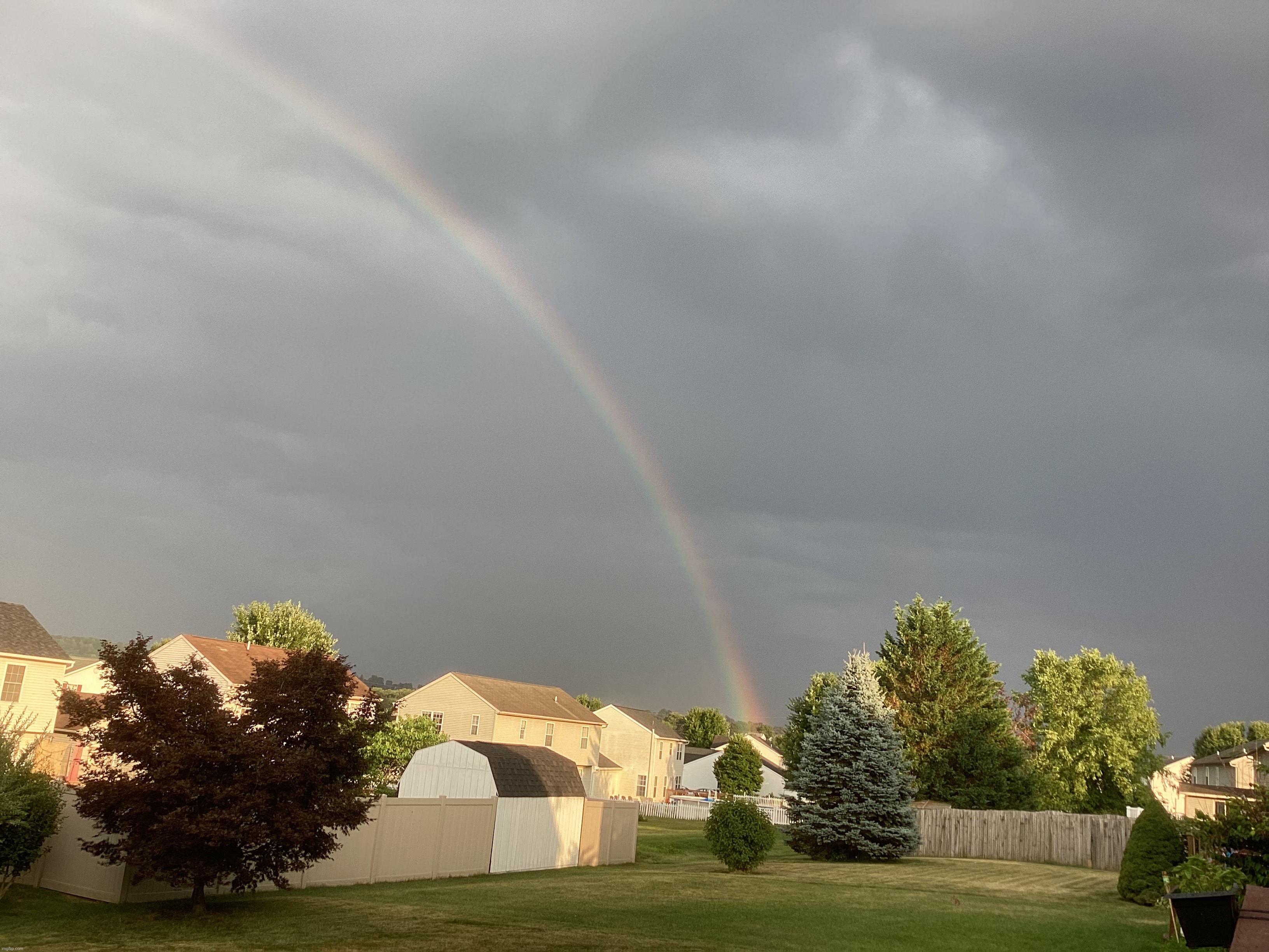 A rainbow near my house a couple of minutes, leading to the pot o’ gold. Taken 7:19 PM EST 7/18/22 | image tagged in share your own photos | made w/ Imgflip meme maker