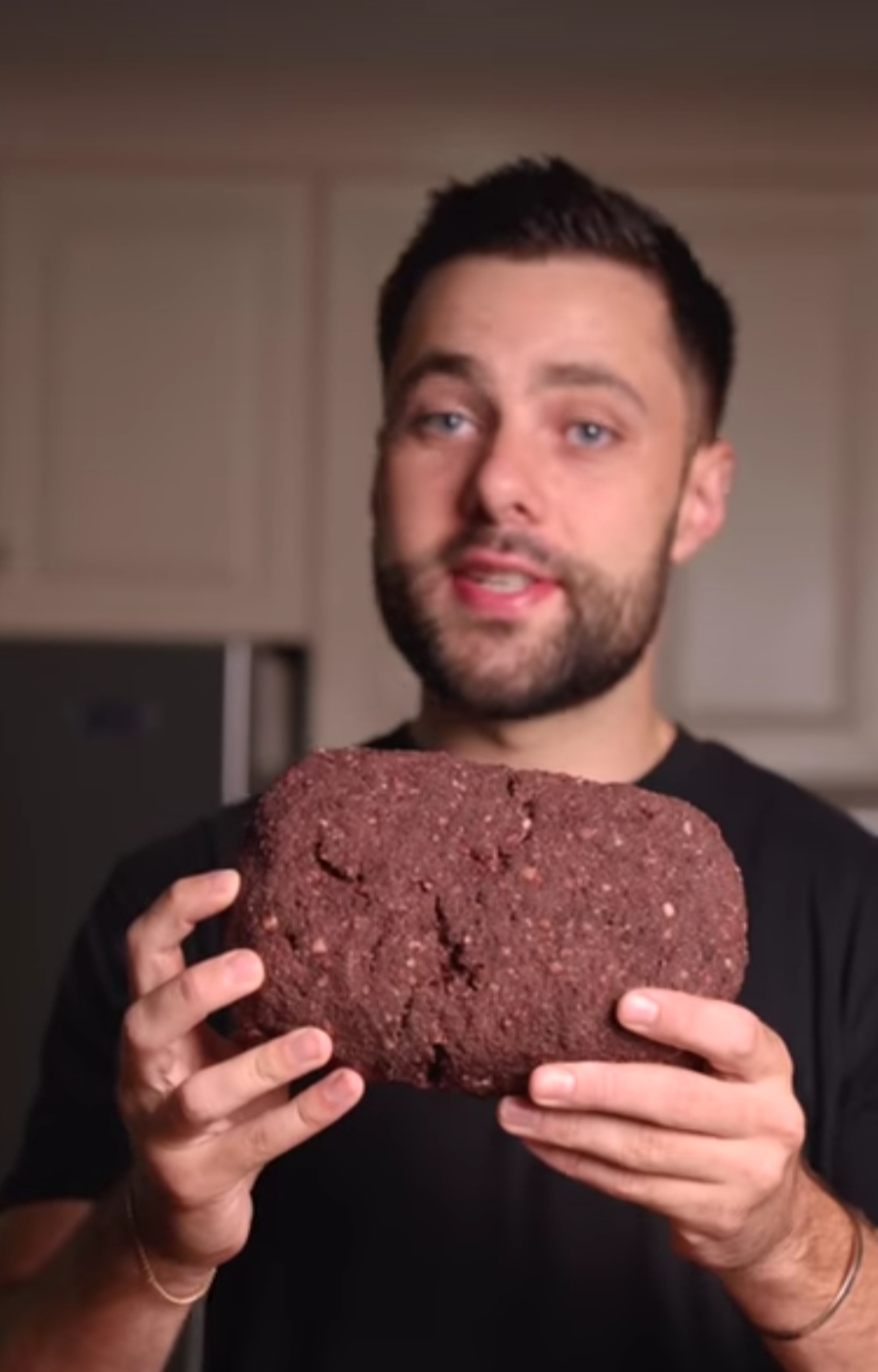 Man with something a dry aged impossible meat that looks like a Blank Meme Template