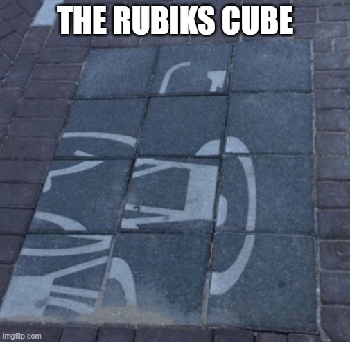 The true rubiks cube | THE RUBIKS CUBE | image tagged in puzzling | made w/ Imgflip meme maker
