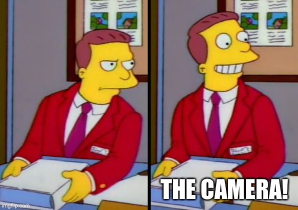 Simpsons Truth Lionel Hutz | THE CAMERA! | image tagged in simpsons truth lionel hutz | made w/ Imgflip meme maker