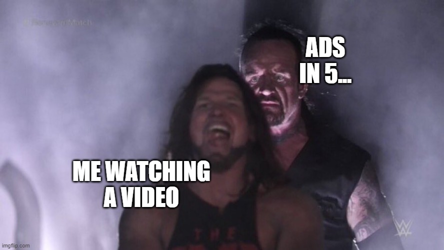 AJ Styles & Undertaker | ADS IN 5... ME WATCHING A VIDEO | image tagged in aj styles undertaker | made w/ Imgflip meme maker