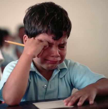 kid crying while doing homework meme