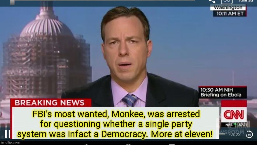 cnn breaking news template | FBI's most wanted, Monkee, was arrested for questioning whether a single party system was infact a Democracy. More at eleven! | image tagged in cnn breaking news template | made w/ Imgflip meme maker