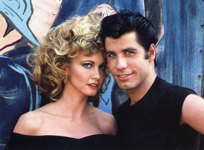 Olivia Newton-John and John Travolta during the filming of ‘Grease’ | image tagged in awesome,pics,photography,rip | made w/ Imgflip meme maker