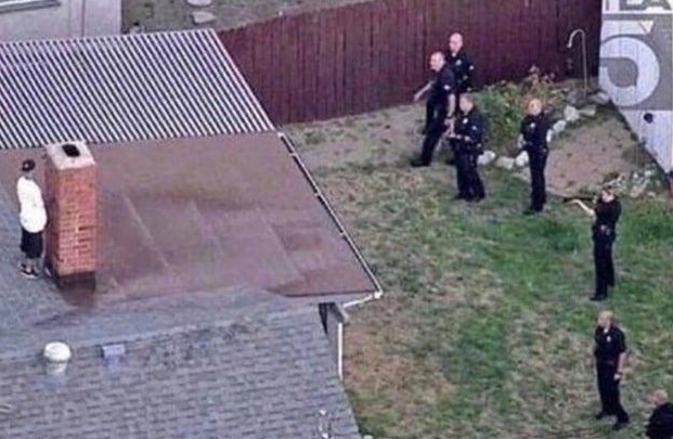 MAN HIDES FROM COPS, ROOF, CHIMNEY Blank Meme Template
