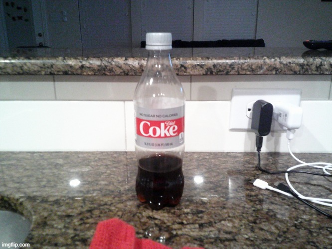 I took this picture of my Coke Bottle in January 2021, a year after Rani died | image tagged in coke bottle | made w/ Imgflip meme maker