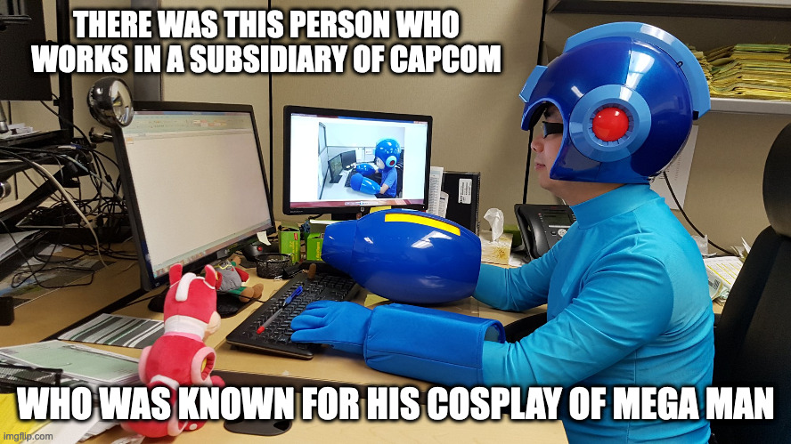 Capcom Subsidiary Employee in Mega Man Cosplay | THERE WAS THIS PERSON WHO WORKS IN A SUBSIDIARY OF CAPCOM; WHO WAS KNOWN FOR HIS COSPLAY OF MEGA MAN | image tagged in capcom,memes,megaman | made w/ Imgflip meme maker