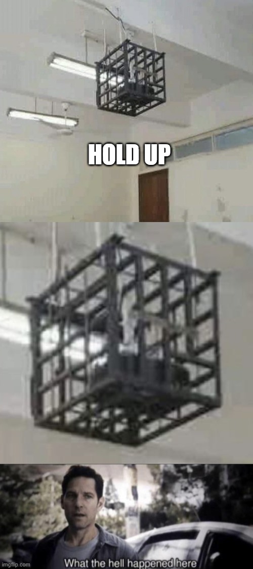 Projector Cage | HOLD UP | image tagged in what the hell happened here | made w/ Imgflip meme maker