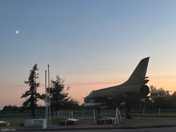 MiG-21 on display at a gas station in Poland (northbound S7 freeway, roughly between the city of Radom and the capital Warsaw) | image tagged in share your own photos | made w/ Imgflip meme maker