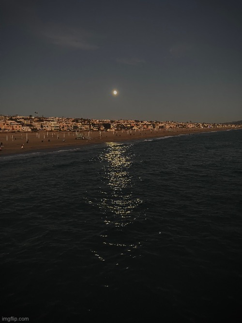 The moon over a coastal town | made w/ Imgflip meme maker