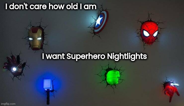 Never too late to have a happy Childhood |  I don't care how old I am; I want Superhero Nightlights | image tagged in toys,growing up,well yes but actually no,superheroes,afraid of the dark | made w/ Imgflip meme maker