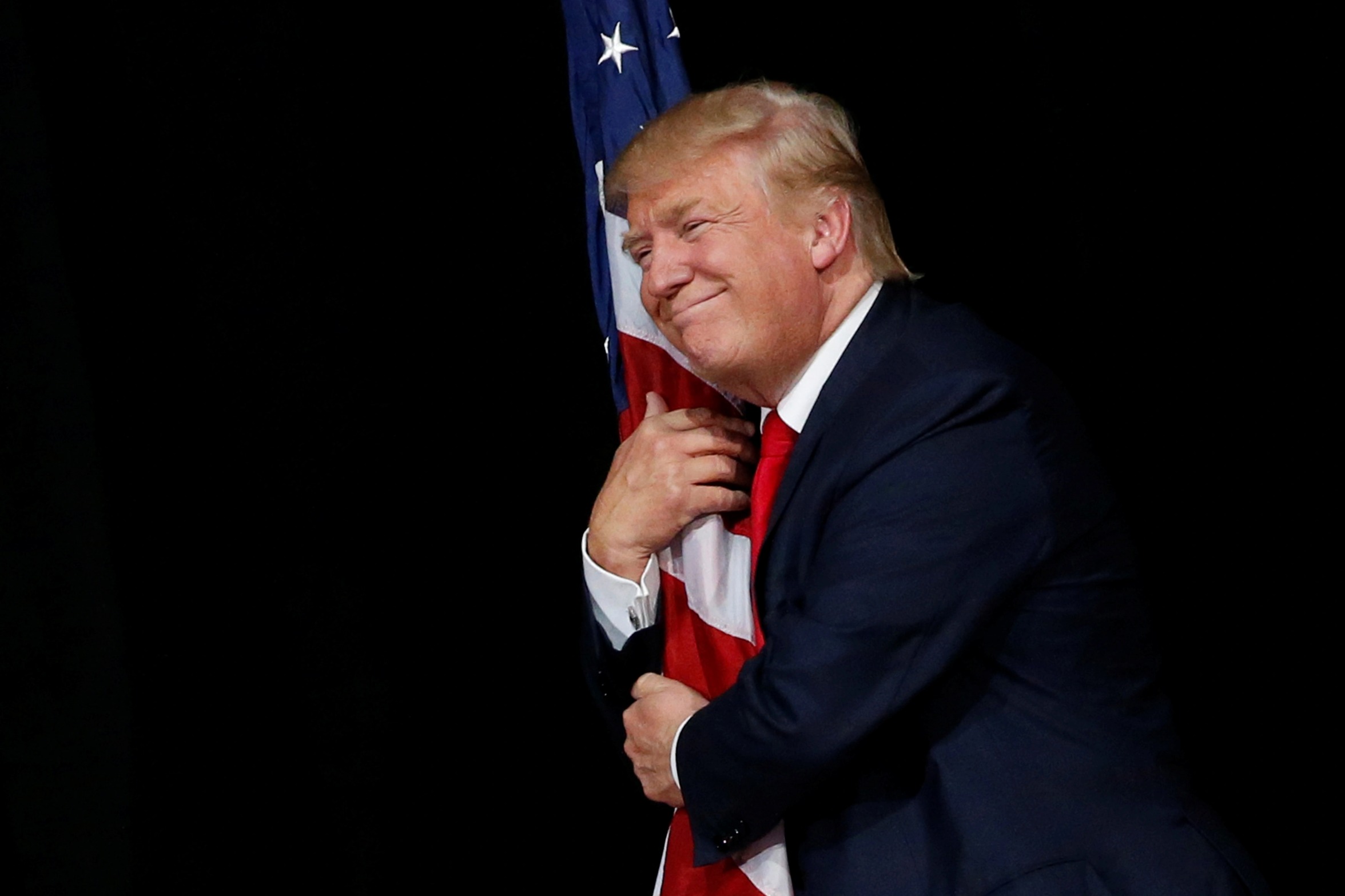 Trump holding the American Flag Blank Meme Template